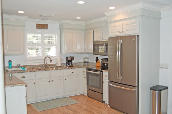 Kitchen "AFTER" with painted cabinets and new appliances